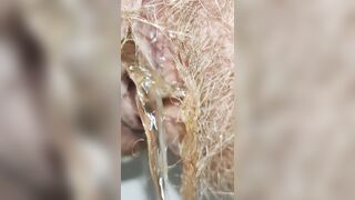 Girl with Delicious Extra Hairy Pussy Peeing Mega Close Up