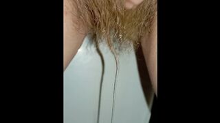 Point of view on the Hairy Pussy Pissing in the Toilet Powerful Standing Pee