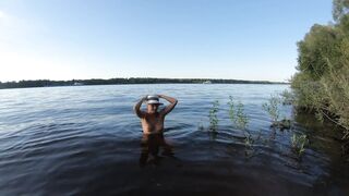 Nude girl swims and shows her ass in a cancer pose