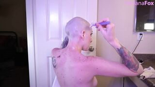 Tattooed Bald Slut Razor Shaves Head And Cums