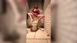 Girl is so horny she cums in a bathroom stall