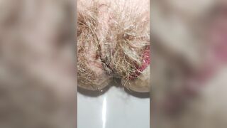 Schoolgirl with small ass but big hairy pussy pissing for you super mega closeup