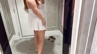 BIG TIT MILF TRIES ON TRANSPARENT DRESS IN A STORE