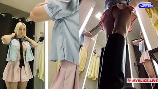 Upskirt view on Blonde with big boobs tries on transparent clothes. Video from public locker room